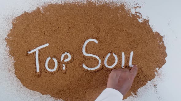 Hand Writes On Soil  Top Soil