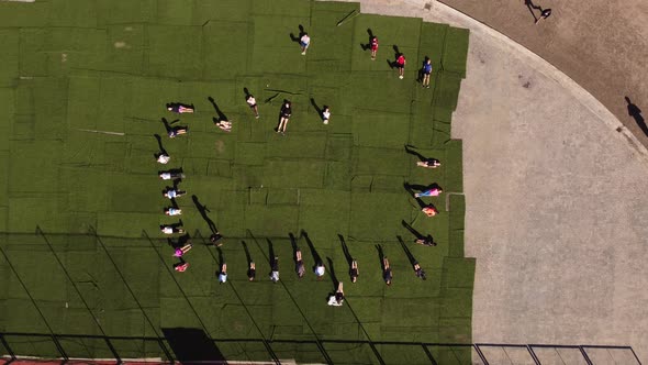 Freshmen batch of students praticing leg raises Argentina