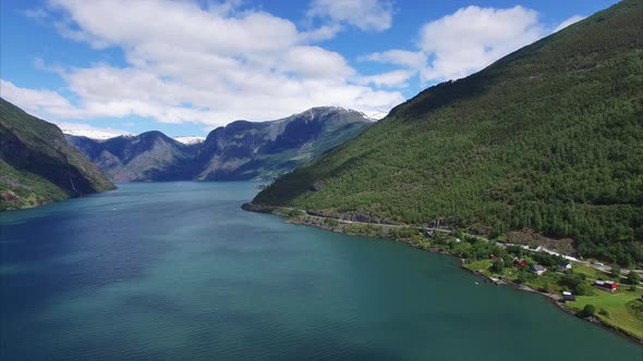 Panning aerial view above fjord in Norway.