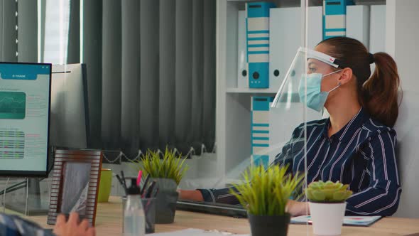 Businesswoman Wearing Face Protection on New Normal Workplace