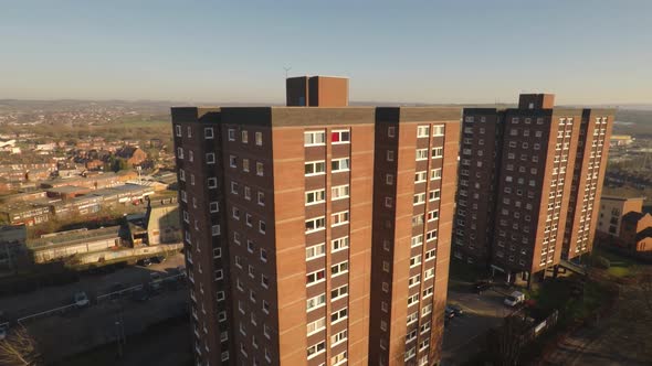 Aerial footage view of high rise tower blocks, flats built in the city of Stoke on Trent to accommod