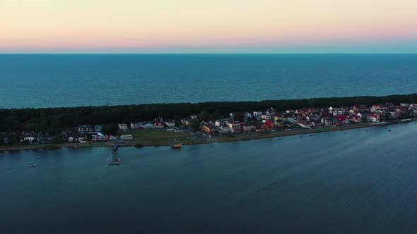 Aerial view of a beautiful beach with white sand in Chalupy village, Baltic Sea, Poland, drone sidee