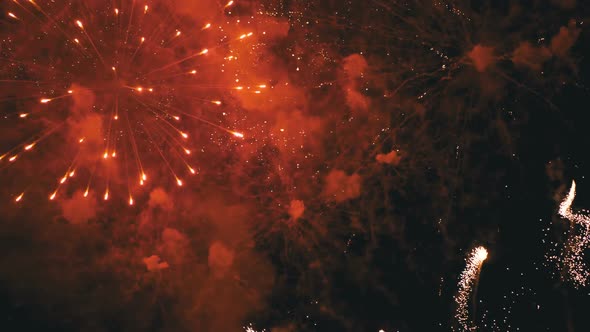 Fireworks Flashing in the Night Sky. Slow Motion. Real Fireworks with Smoke