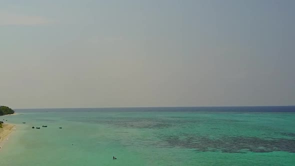 Aerial drone travel of exotic coast beach time by blue lagoon with sand background