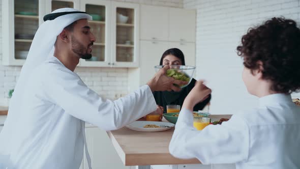 arabian family spending time together at home