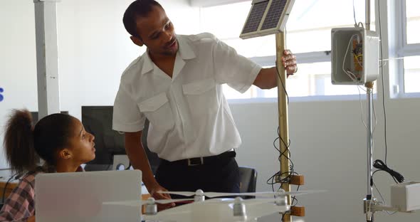 Male Pilot Training About Solar Panel to Kid 4k