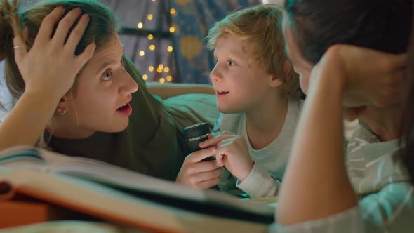 Joyous LGBTQ Family Laughing in Bed