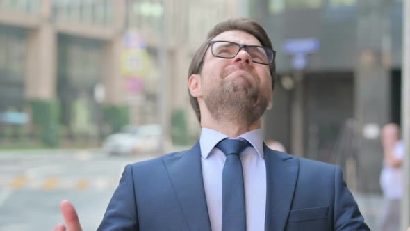 Portrait of Upset Businessman Reacting to Failure, Outdoor