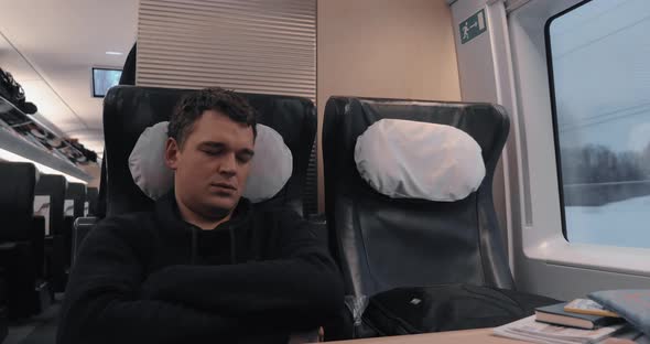 Sleeping man in express train