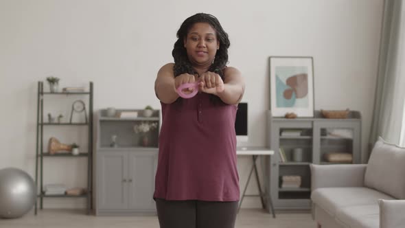 Woman Doing Exercises at Home