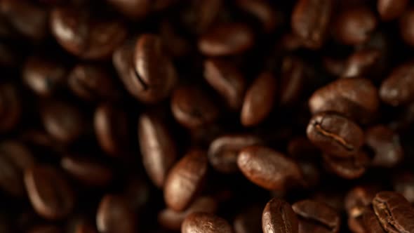 Super Slow Motion Shot of Exploding Premium Coffee Beans Towards the Camera at 1000Fps