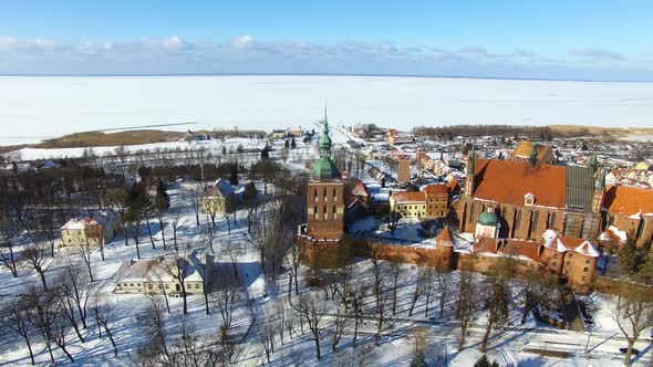 Aerial: Castle of Frombork in Poland, wintertime