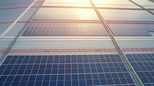 Drone flying over photovoltaic solar panels