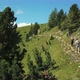Man and woman hiking in mountain landscape, Alta Badia, Italy - VideoHive Item for Sale