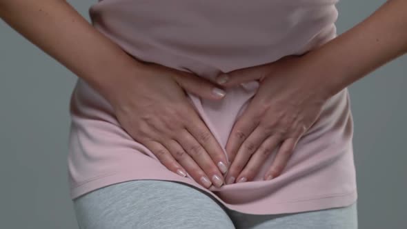 Female Holding Lower Belly, Suffering From Premenstrual Syndrome, Hormone