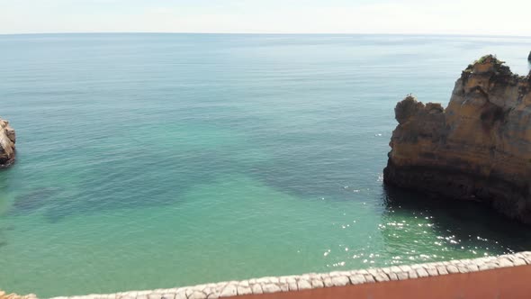 Roman style bridge connecting two rock formations in Lagos, Algarve, Portugal