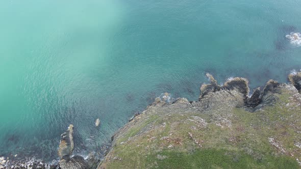 Turquoise Blue Water By The Irish Sea And  The Rocky Cliffs Near Dublin And Bray Town In Wicklow, Ir