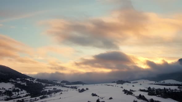 Winter Video Landscape Snowcovered Hills Orandz Clouds at Dusk