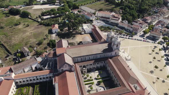 Aerial above view of notable complex Alcobaca monastery in Portugal.