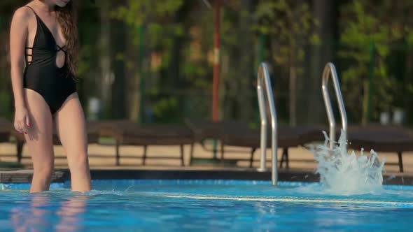 Girl Goes to the Pool