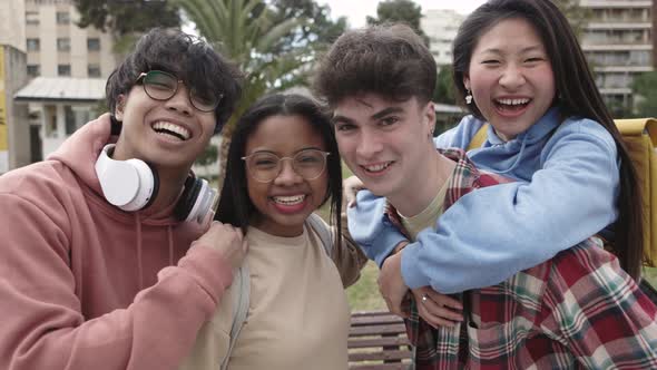 Group Portrait of Young Multiracial Students Friends on School Campus