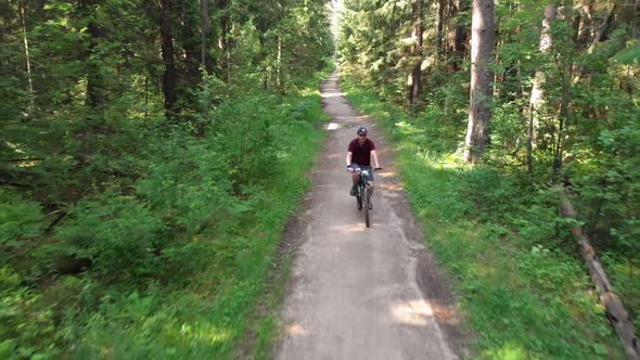 Young Cyclist Riding on a Nice Road