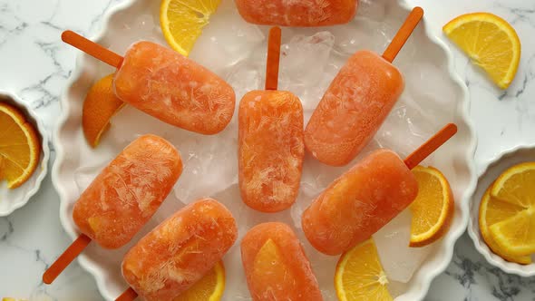 Homemade Juicy Orange Popsicles