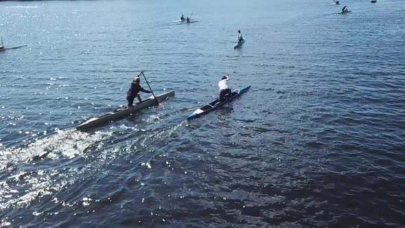 Two Mans Athletes Canoeist Paddling in Canoe on River on Training