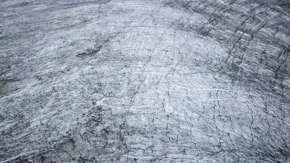 Topdown view of an Alpin glacier texture in the swiss alps region in Europe