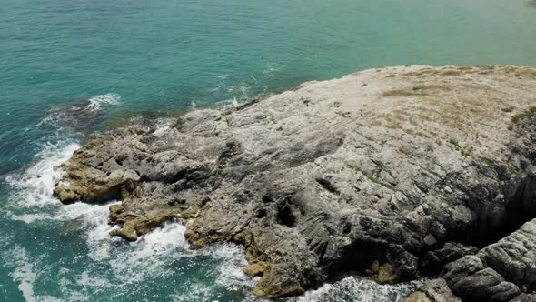 Clean Sea Waves And Rocks Aerial View