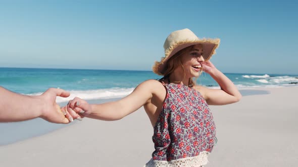 Woman enjoying free time on the beach