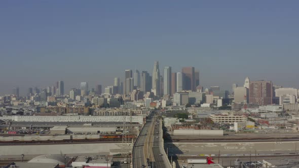 AERIAL: Towards Downtown Los Angeles Over LA River with Constructions and Cars,traffic, Daylight 
