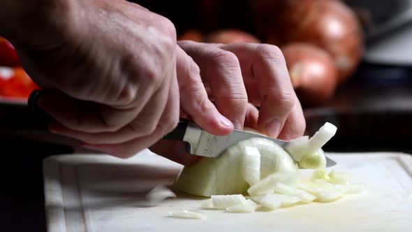 Chopping an onion, close shot