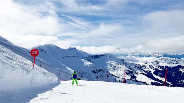 Fast Action Shoot of a Skiing Boy Going Downhill on Track