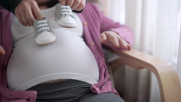 Pregnant Couple Feels Love and Relax at Home