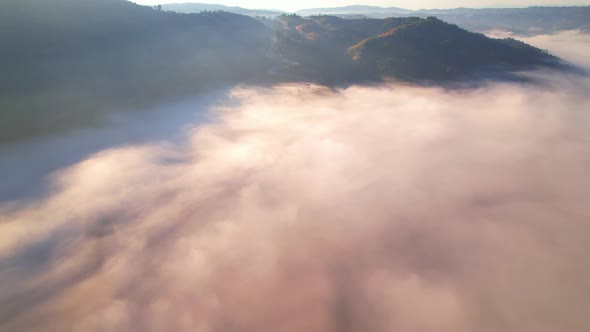 4K Aerial view of Mountains landscape with morning fog.