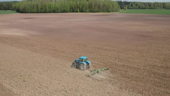 Farming Tractor in the the Field