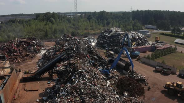 Old Wrecked Cars in Junkyard Waiting to Be Shredded in a Recycling Park