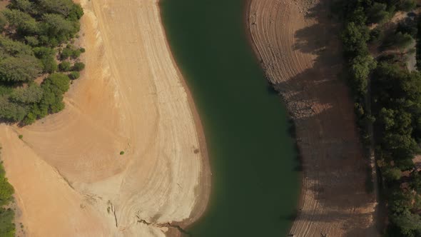 Aerial view of Shasta Lake straight down passing bridges in Northern California low water levels dur