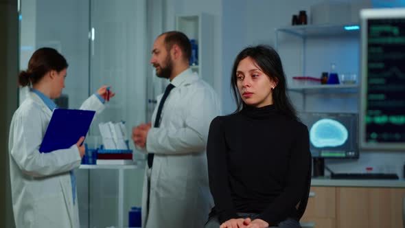 Team of Scientists Doctor Discussing Health Status of Patient