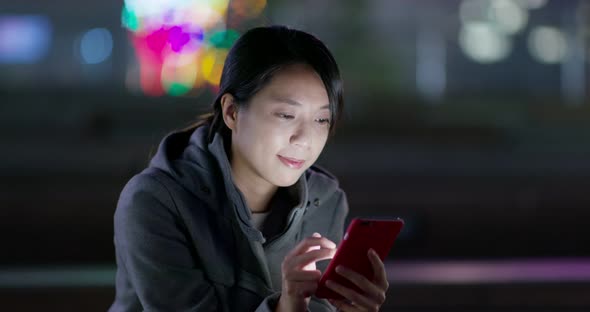 Woman Use of Mobile Phone at Night