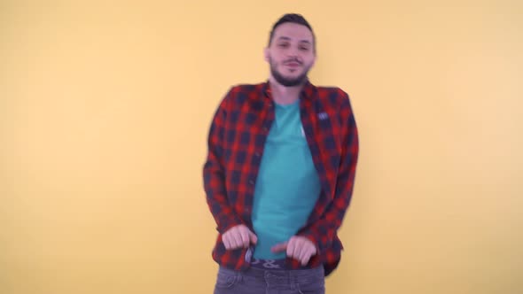 Casual Young Man in Shirt Happy Dancing