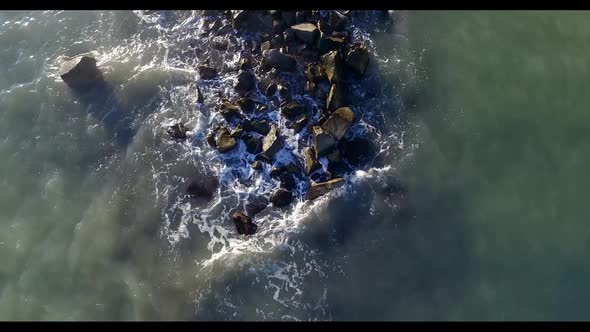 Sea Waves Beating Against the Rocks. Shooting From Above