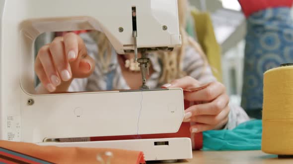 Young woman working in a fashion studio