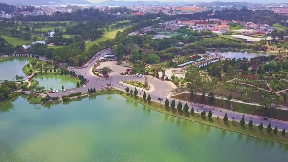 Drone Flies Over Wonderful Tranquil Lake and Road