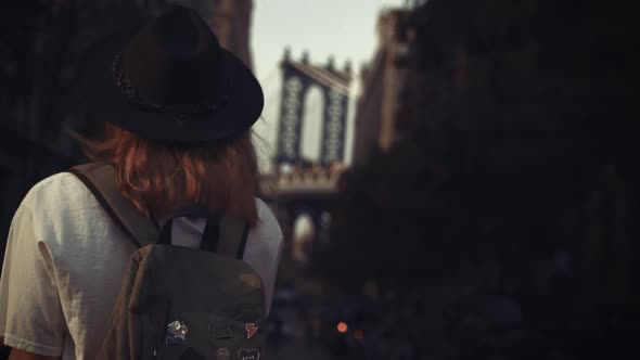 Pretty Woman at The Brooklyn Bridge in New York City at Sunrise