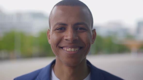 Happy African American Man Looking at Camera