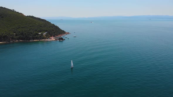 4k Aerial view of the bay and boat, yacht sailing on this island of Burgazada in Istanbul,