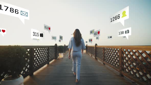 Forwards Tracking on Woman Walking on Wooden Pier