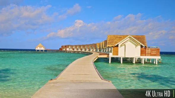 4K Walkway to luxury overwater bungalows or villas in the Maldives